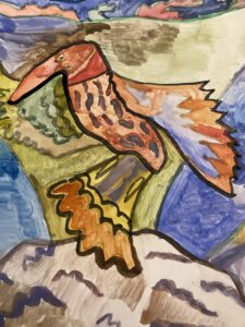 Värikäs lintu, jolla pitkä nokka.